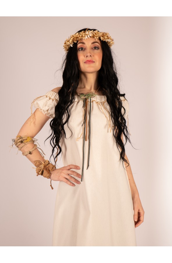 Medieval dress in cream with cords on...
